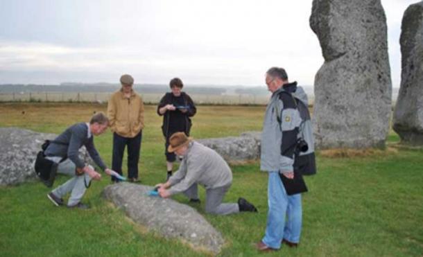 Paul Devereux measuring sound frequencies emitted by the stones at Stonehenge
